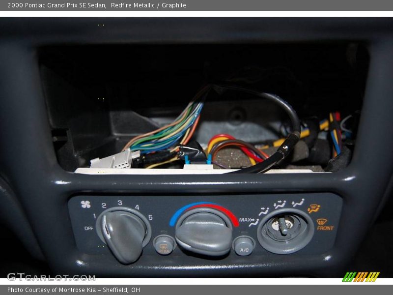 Redfire Metallic / Graphite 2000 Pontiac Grand Prix SE Sedan