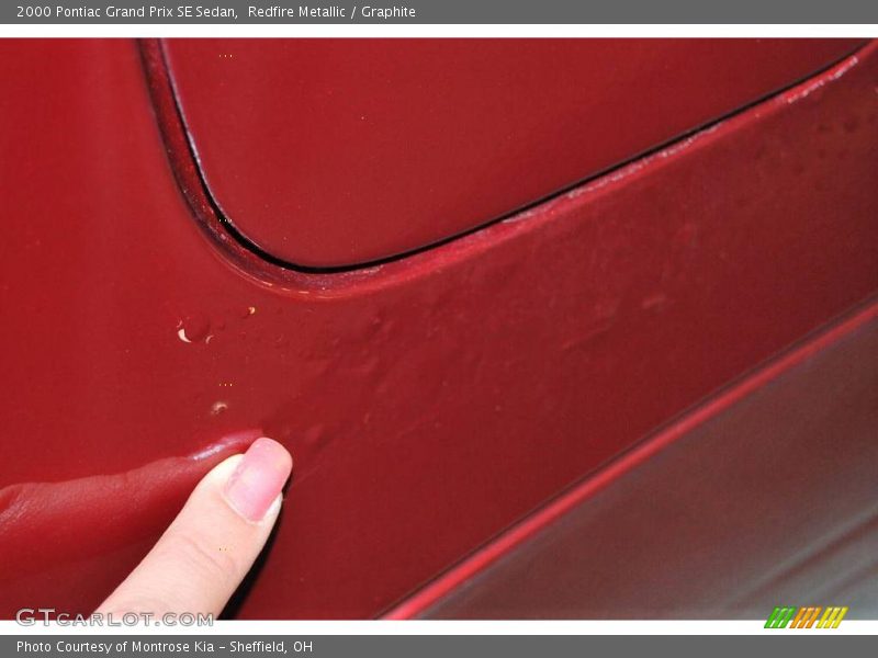 Redfire Metallic / Graphite 2000 Pontiac Grand Prix SE Sedan