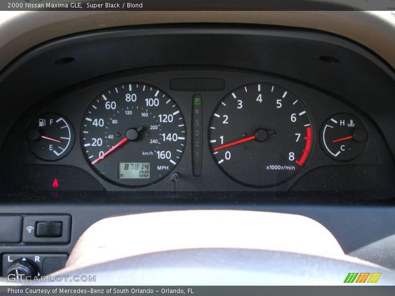 Super Black / Blond 2000 Nissan Maxima GLE