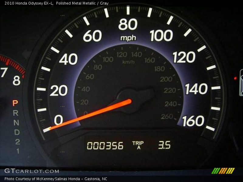 Polished Metal Metallic / Gray 2010 Honda Odyssey EX-L