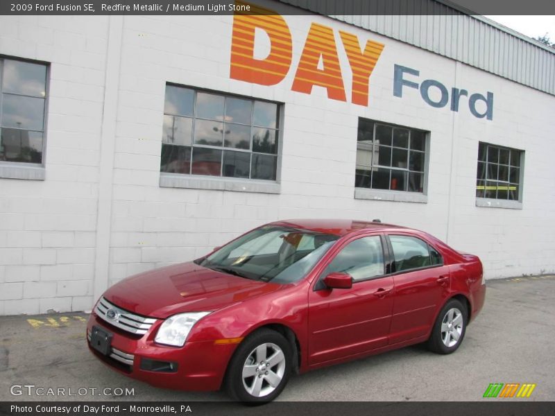 Redfire Metallic / Medium Light Stone 2009 Ford Fusion SE