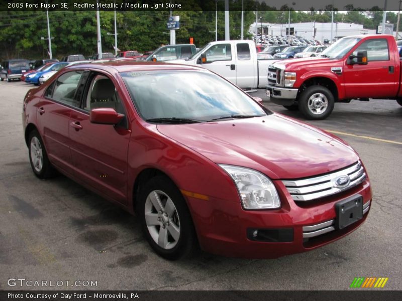 Redfire Metallic / Medium Light Stone 2009 Ford Fusion SE