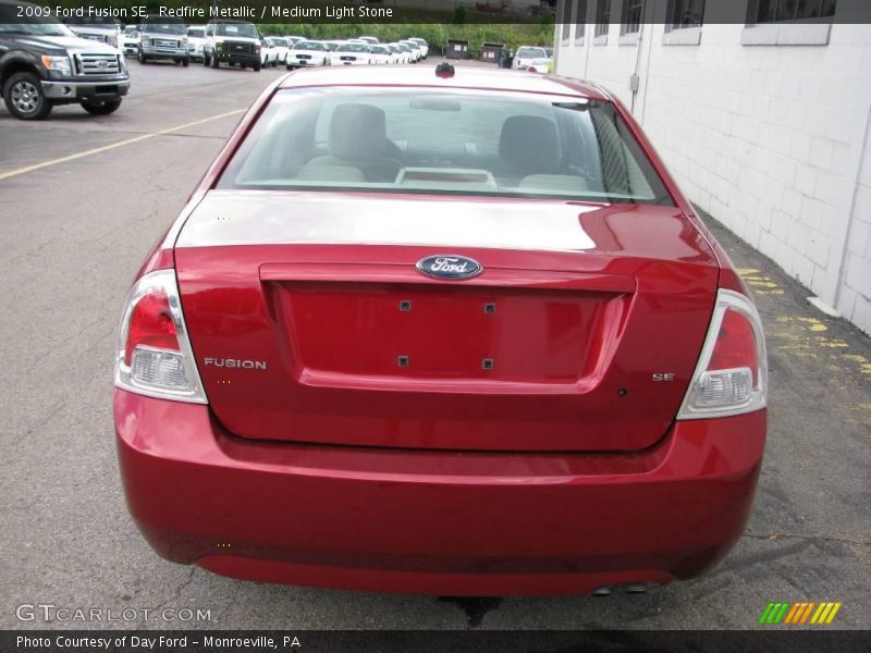 Redfire Metallic / Medium Light Stone 2009 Ford Fusion SE
