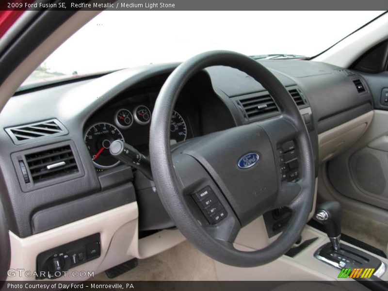 Redfire Metallic / Medium Light Stone 2009 Ford Fusion SE