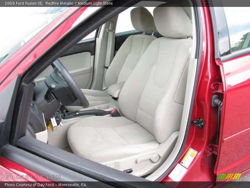 Redfire Metallic / Medium Light Stone 2009 Ford Fusion SE