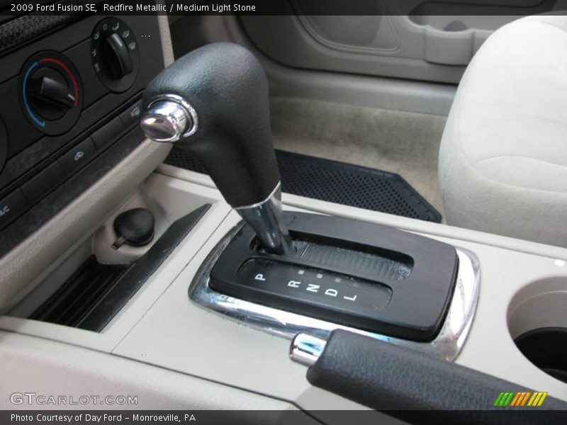 Redfire Metallic / Medium Light Stone 2009 Ford Fusion SE