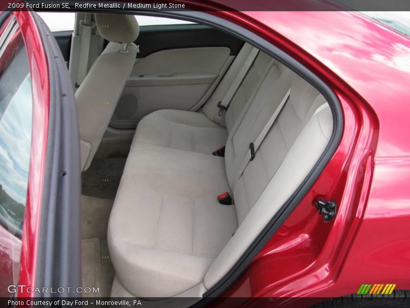 Redfire Metallic / Medium Light Stone 2009 Ford Fusion SE