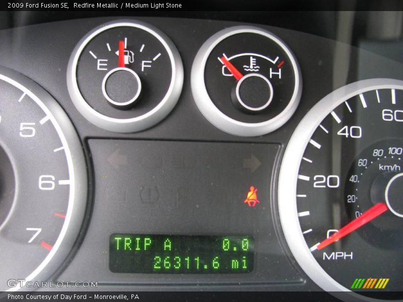 Redfire Metallic / Medium Light Stone 2009 Ford Fusion SE