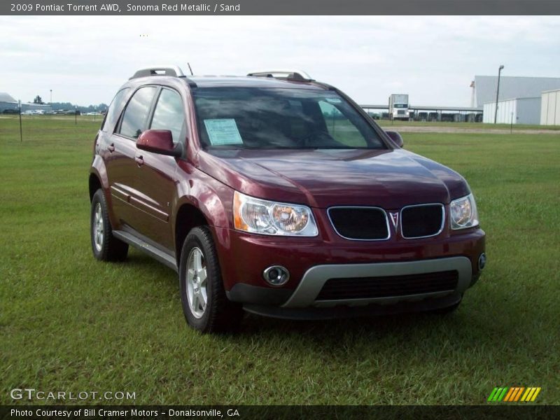 Sonoma Red Metallic / Sand 2009 Pontiac Torrent AWD