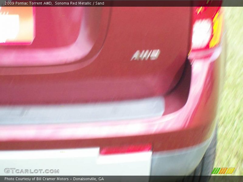 Sonoma Red Metallic / Sand 2009 Pontiac Torrent AWD
