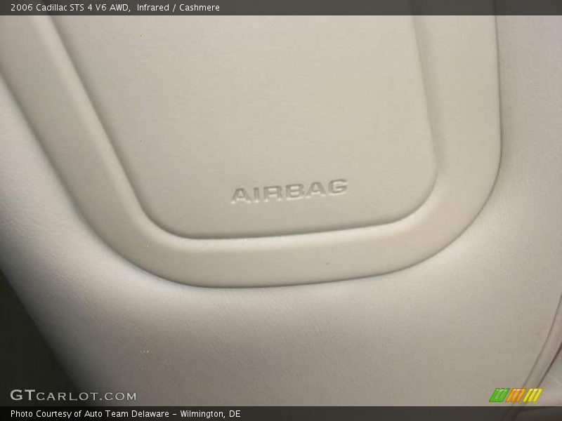 Infrared / Cashmere 2006 Cadillac STS 4 V6 AWD