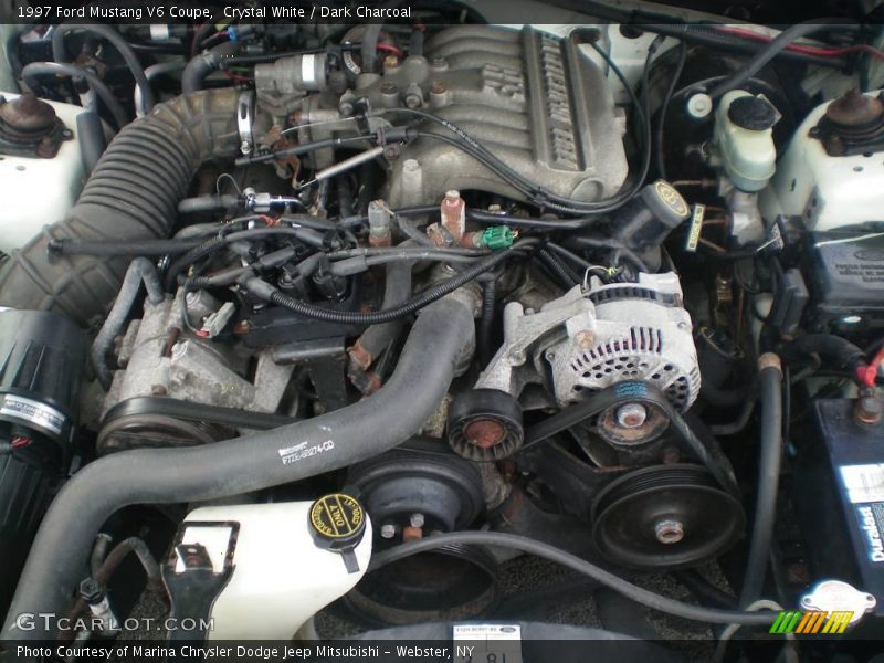 Crystal White / Dark Charcoal 1997 Ford Mustang V6 Coupe
