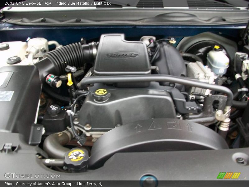 Indigo Blue Metallic / Light Oak 2002 GMC Envoy SLT 4x4