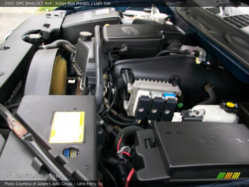 Indigo Blue Metallic / Light Oak 2002 GMC Envoy SLT 4x4