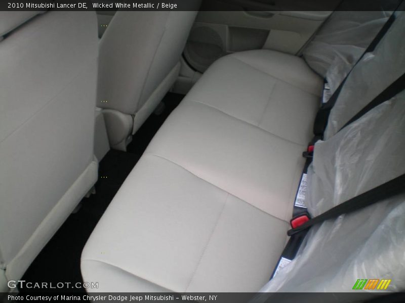 Wicked White Metallic / Beige 2010 Mitsubishi Lancer DE