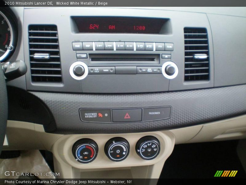 Wicked White Metallic / Beige 2010 Mitsubishi Lancer DE