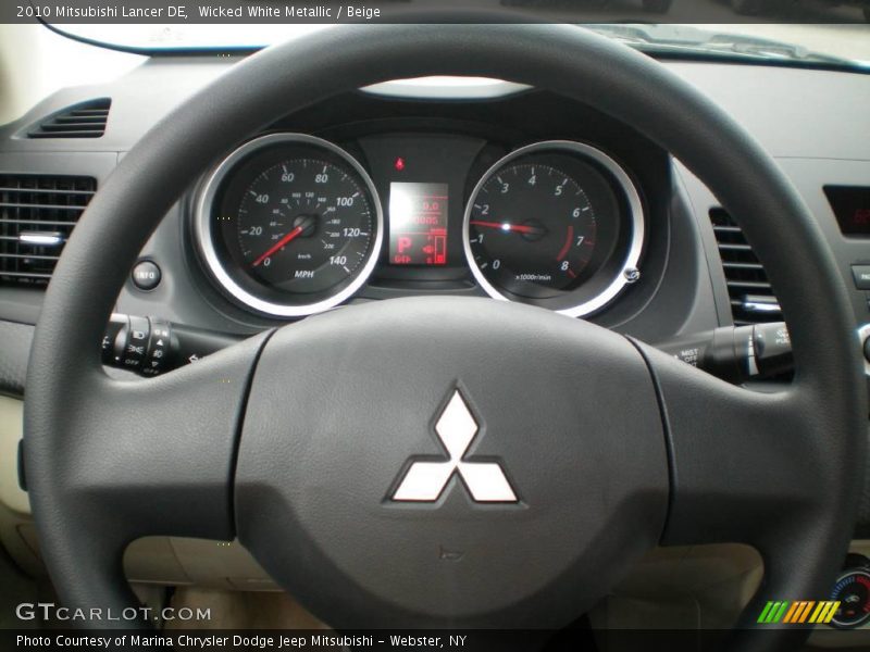 Wicked White Metallic / Beige 2010 Mitsubishi Lancer DE