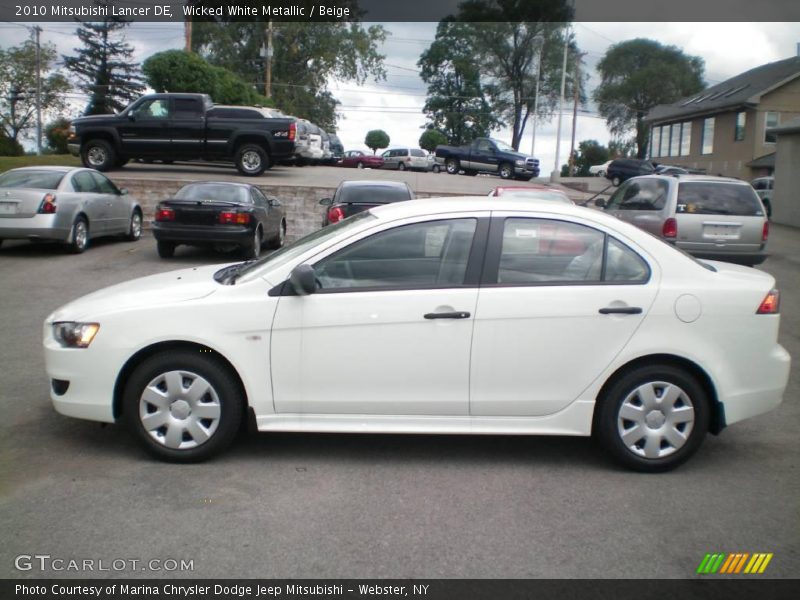 Wicked White Metallic / Beige 2010 Mitsubishi Lancer DE
