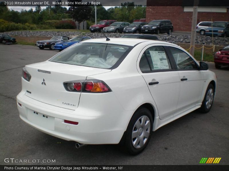 Wicked White Metallic / Beige 2010 Mitsubishi Lancer DE