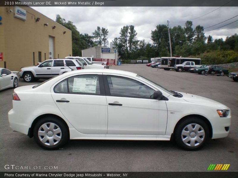 Wicked White Metallic / Beige 2010 Mitsubishi Lancer DE