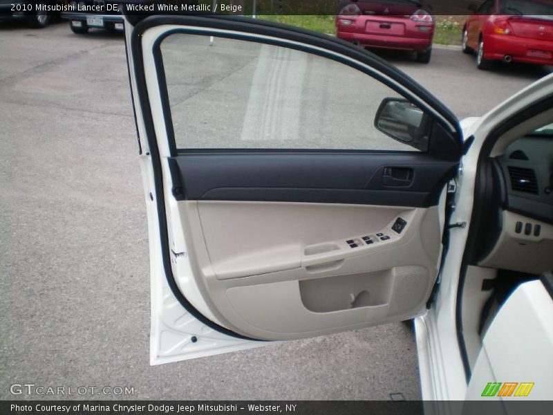 Wicked White Metallic / Beige 2010 Mitsubishi Lancer DE