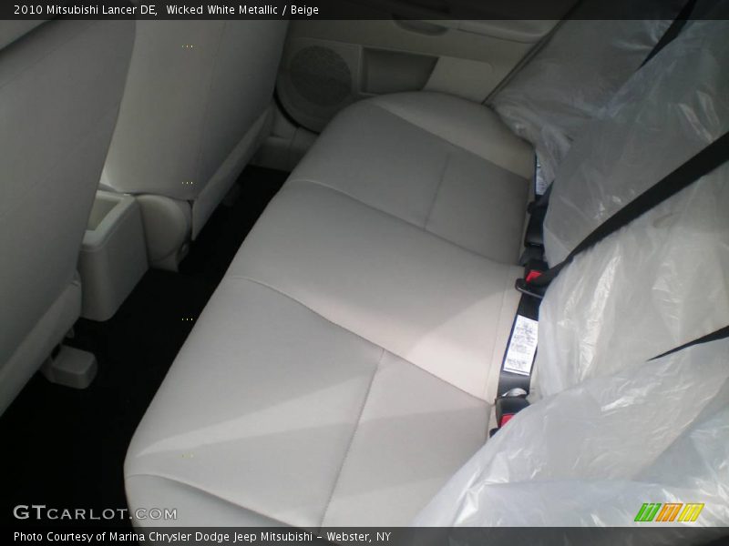 Wicked White Metallic / Beige 2010 Mitsubishi Lancer DE
