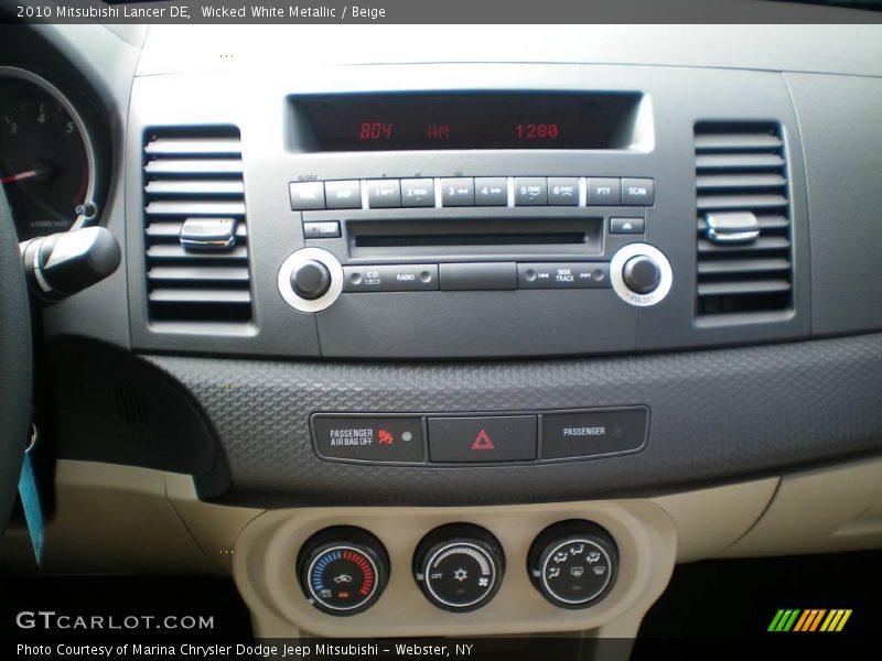 Wicked White Metallic / Beige 2010 Mitsubishi Lancer DE