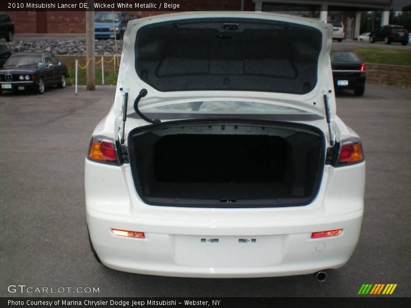 Wicked White Metallic / Beige 2010 Mitsubishi Lancer DE