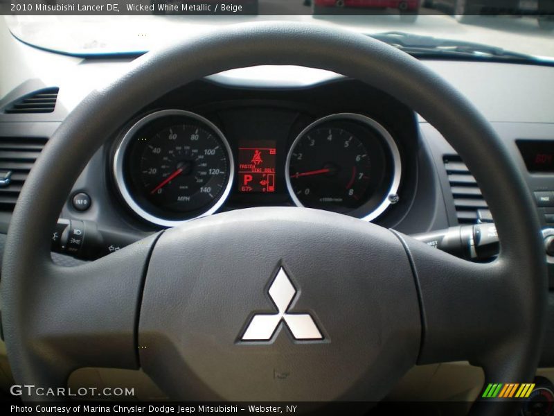 Wicked White Metallic / Beige 2010 Mitsubishi Lancer DE
