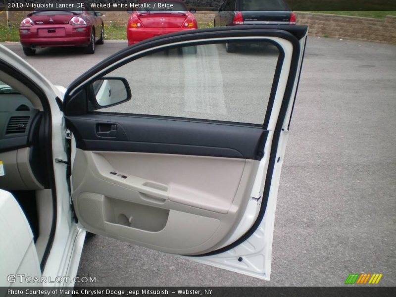 Wicked White Metallic / Beige 2010 Mitsubishi Lancer DE