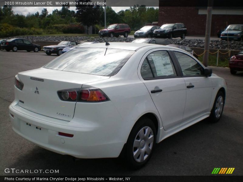 Wicked White Metallic / Beige 2010 Mitsubishi Lancer DE