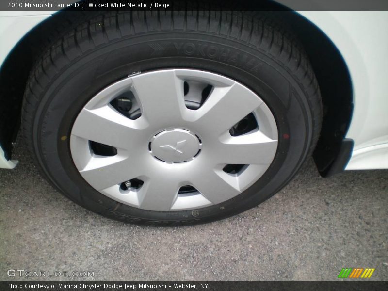 Wicked White Metallic / Beige 2010 Mitsubishi Lancer DE