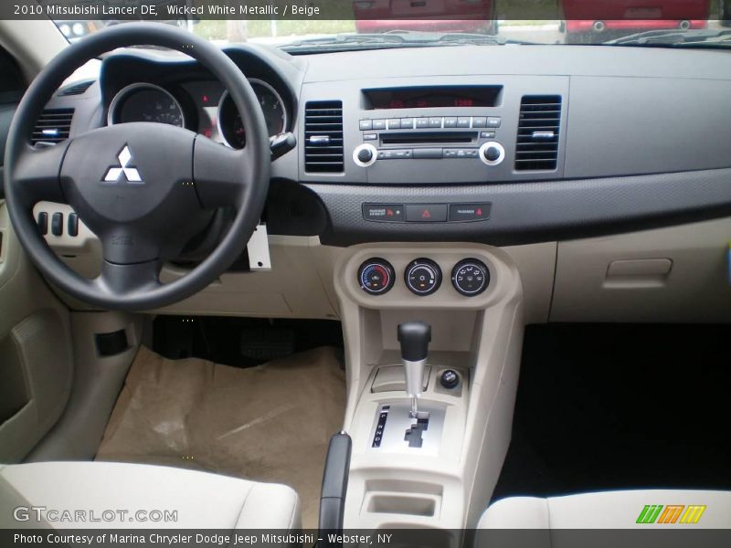Wicked White Metallic / Beige 2010 Mitsubishi Lancer DE