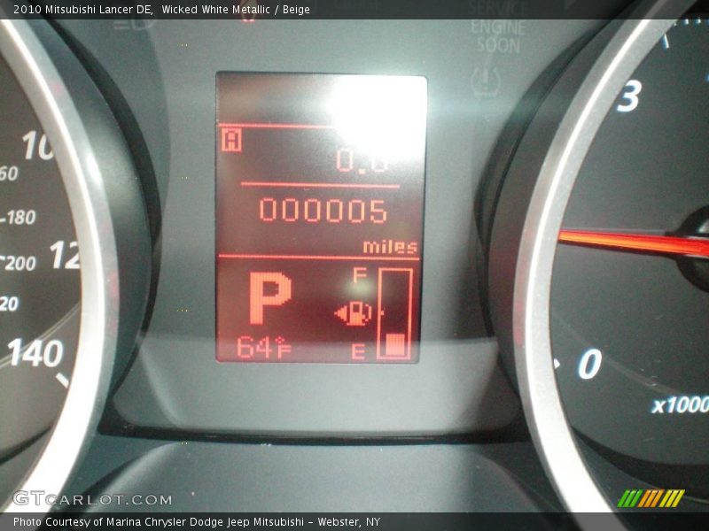 Wicked White Metallic / Beige 2010 Mitsubishi Lancer DE