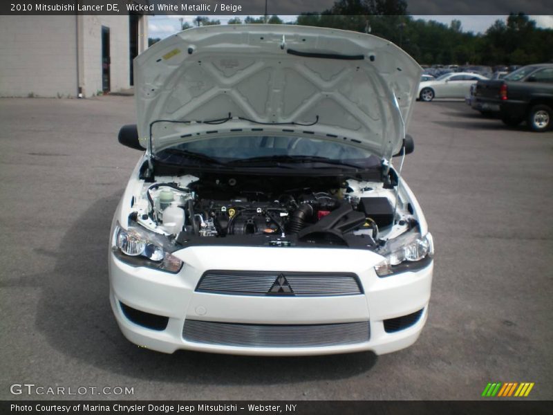 Wicked White Metallic / Beige 2010 Mitsubishi Lancer DE