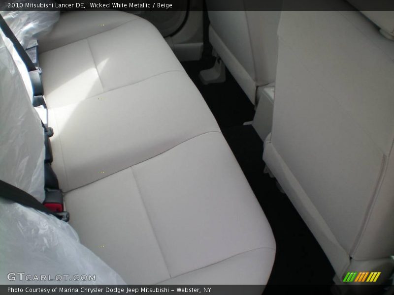 Wicked White Metallic / Beige 2010 Mitsubishi Lancer DE