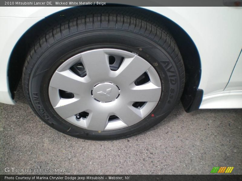 Wicked White Metallic / Beige 2010 Mitsubishi Lancer DE