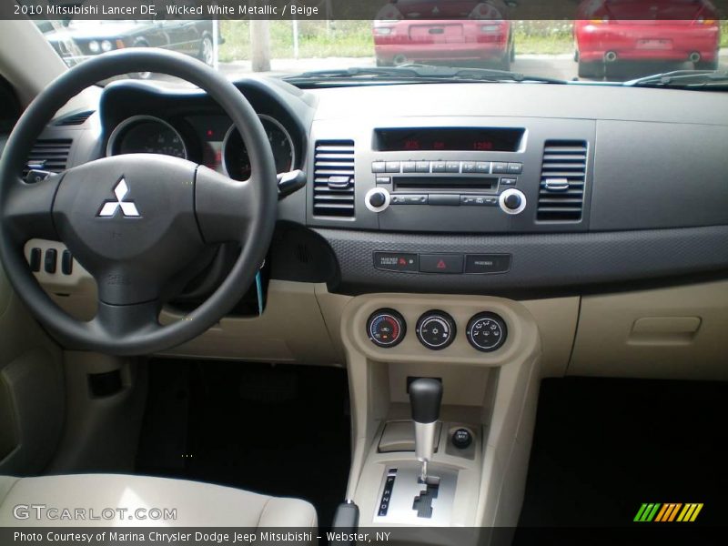 Wicked White Metallic / Beige 2010 Mitsubishi Lancer DE