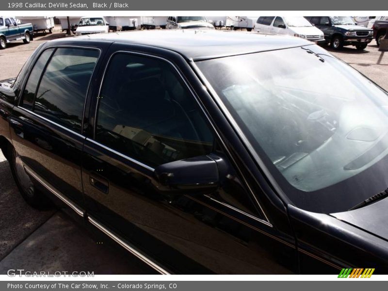Black / Black 1998 Cadillac DeVille Sedan