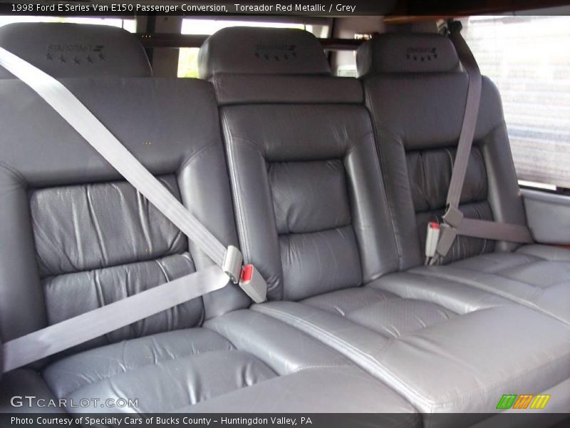 Toreador Red Metallic / Grey 1998 Ford E Series Van E150 Passenger Conversion