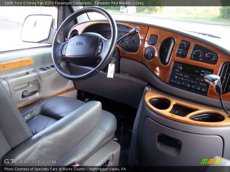 Toreador Red Metallic / Grey 1998 Ford E Series Van E150 Passenger Conversion