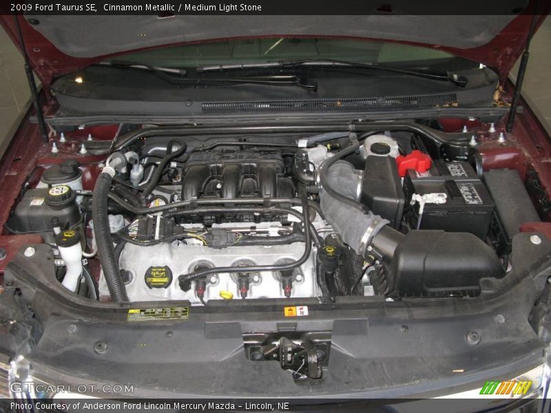 Cinnamon Metallic / Medium Light Stone 2009 Ford Taurus SE