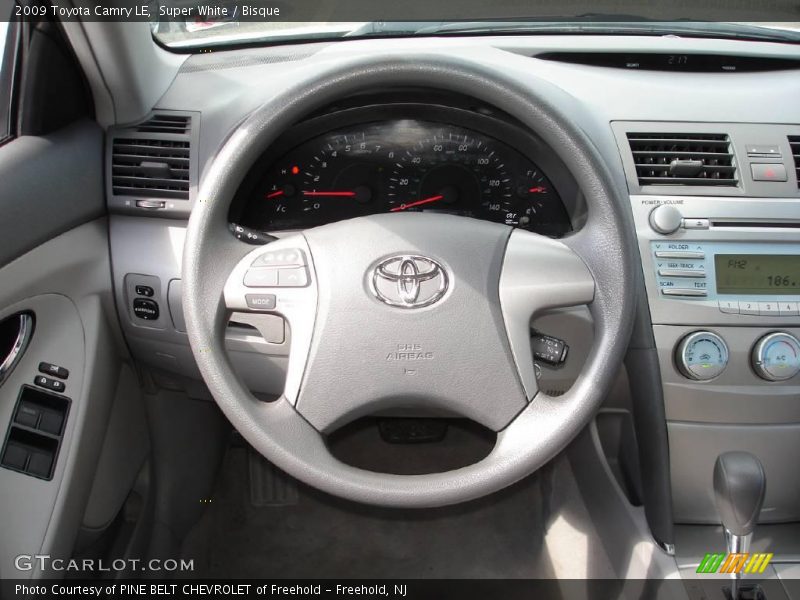 Super White / Bisque 2009 Toyota Camry LE
