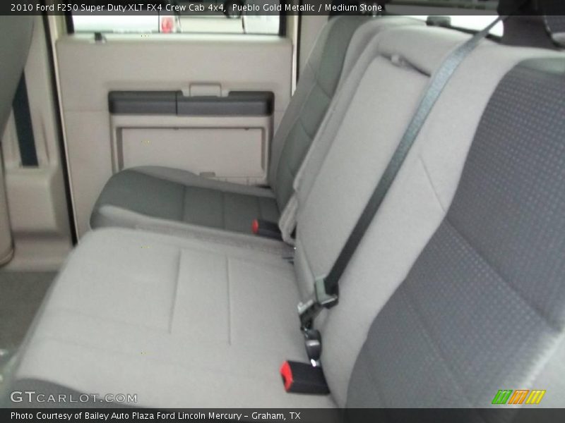Pueblo Gold Metallic / Medium Stone 2010 Ford F250 Super Duty XLT FX4 Crew Cab 4x4
