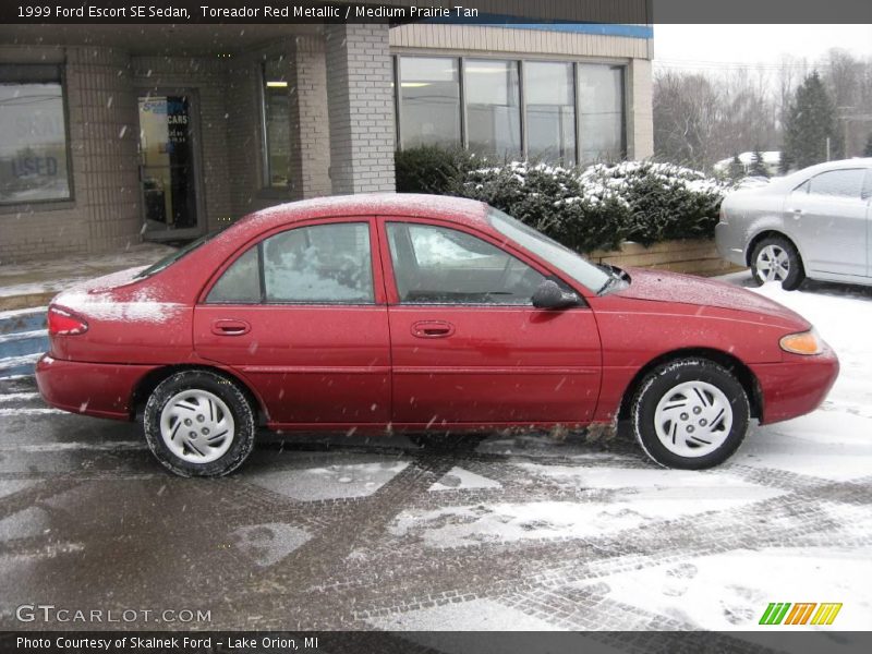Toreador Red Metallic / Medium Prairie Tan 1999 Ford Escort SE Sedan
