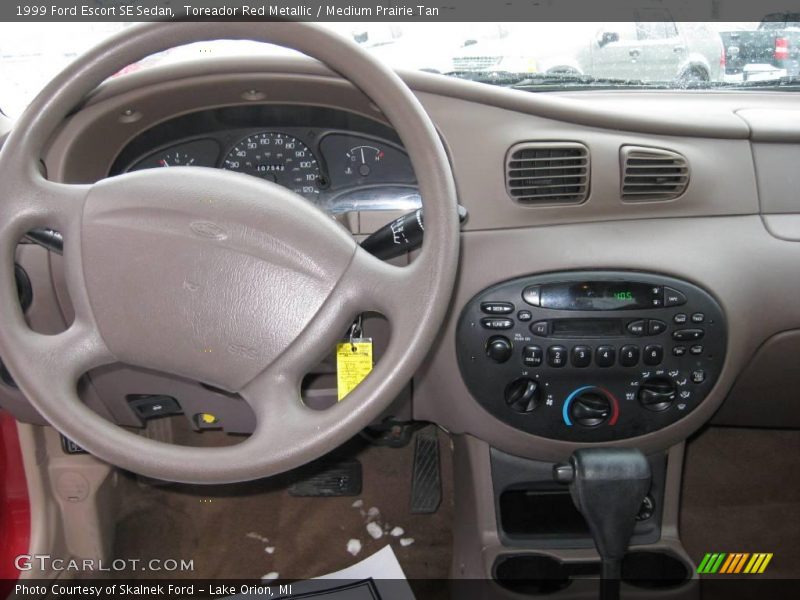 Toreador Red Metallic / Medium Prairie Tan 1999 Ford Escort SE Sedan