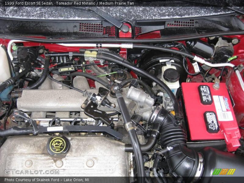 Toreador Red Metallic / Medium Prairie Tan 1999 Ford Escort SE Sedan