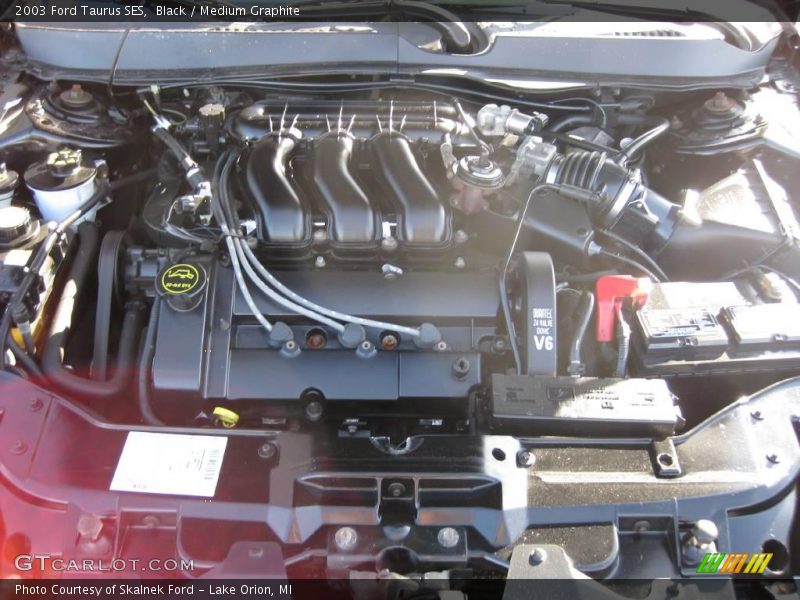 Black / Medium Graphite 2003 Ford Taurus SES