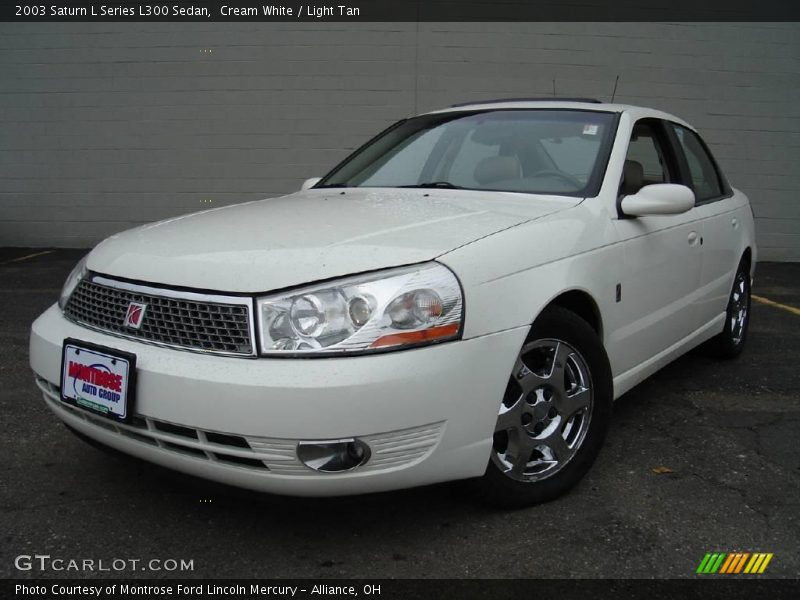 Cream White / Light Tan 2003 Saturn L Series L300 Sedan