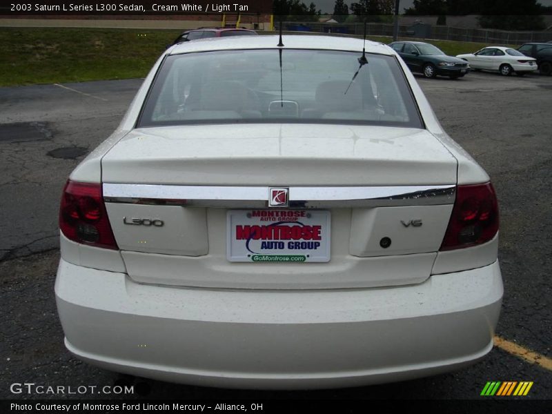 Cream White / Light Tan 2003 Saturn L Series L300 Sedan